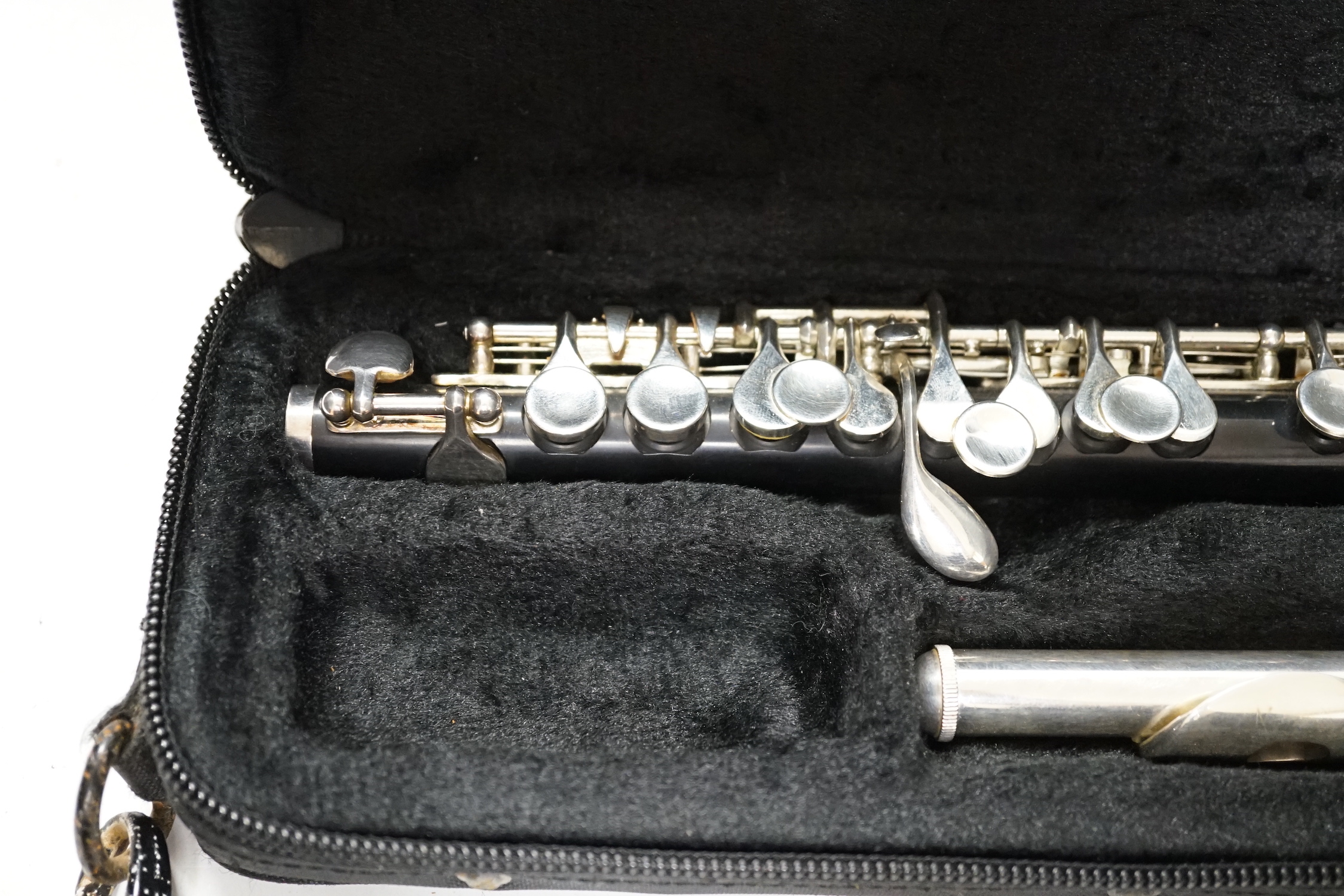 A cased Trevor James student’s piccolo, P1